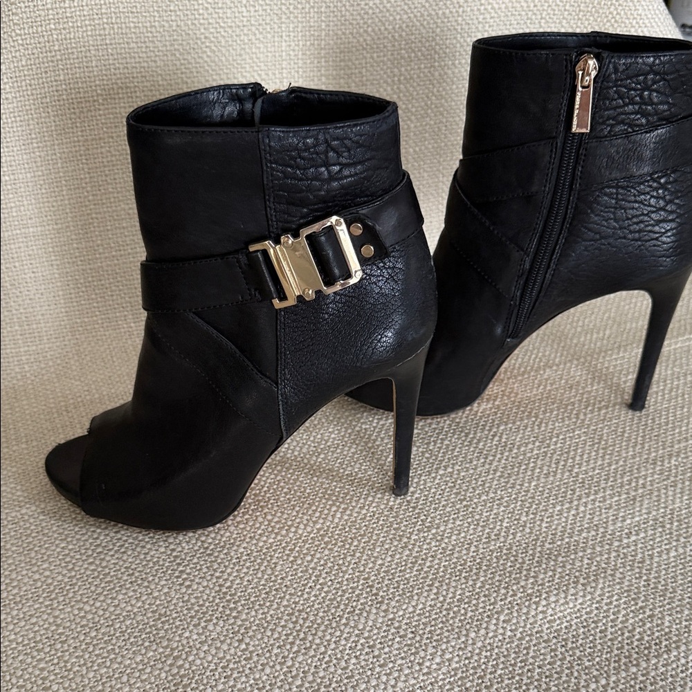 Vince Camuto Black Heeled Boots with Gold Buckle